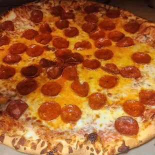 a pepperoni pizza in a box