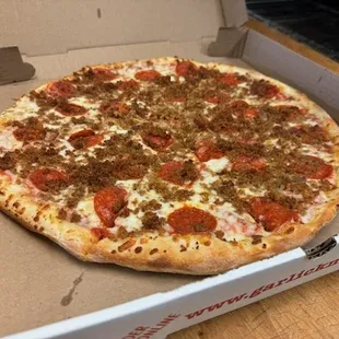 a pizza in a pizza box