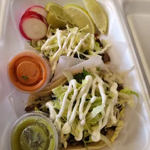 Asada tacos with lettuce and sourcream ADDED