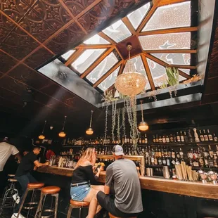 people sitting at a bar