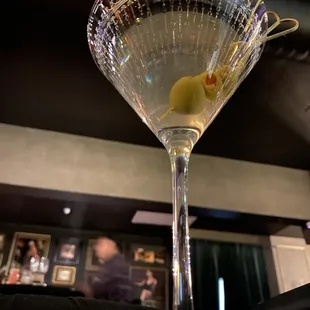 a martini with olives in it