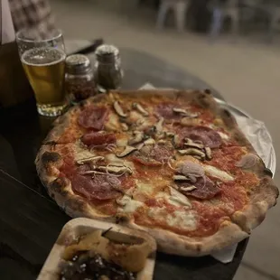 Mushroom &amp; Salami pizza and house marinated olives