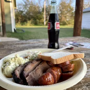 a plate of food on a picnic table