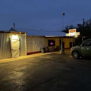 a car parked in front of it