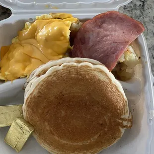 Pancake platter with ham. (The one piece of ham)