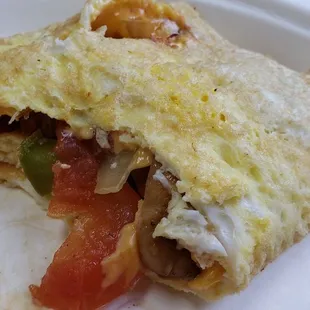 Half eaten veggie omelet