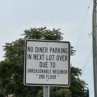 a no diner parking sign