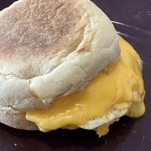 an english muffin sandwich on a plate