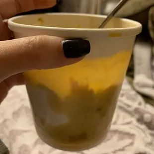 Chili Cheese Bowl $6.50 half filled and swimming in puddles of oil that seeped through container.