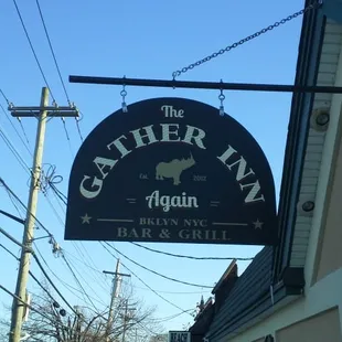 The rhinoceros logo alludes to the mascot of the owners father's former bar, "The Gather Inn."