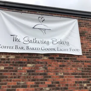 a banner on the side of the building