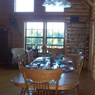 Our dining room table is always set and seats 8The