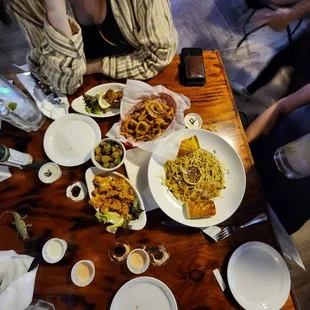 Gator bites, fried pickles, grouper pasta, onion rings, frog legs