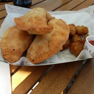 The owners are adorable and so fun. The empanadas were the BOMB! So tasty, crispy, beefy good.