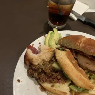 Dripping wet, greasy fried chicken sandwich