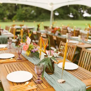 Beautiful florals arranged by TGA. They were kept dry under tents, also a last-minute planning win by TGA.