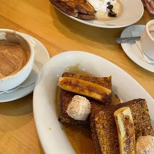 Pecan Crusted French Toast, monthly special latte, Poached Eggs and Grits