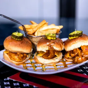 a plate of burgers and french fries