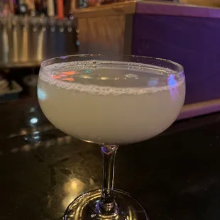 a cocktail in a coupe glass