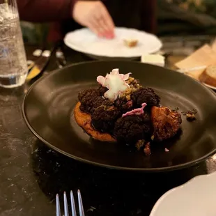 Fried Cauliflower w/ Romesco, Castelvetrano Olive,  and Calabrian Infused Honey