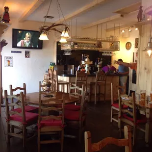 About 10 tables and a couple seats at the bar with an awesome little deli next door.