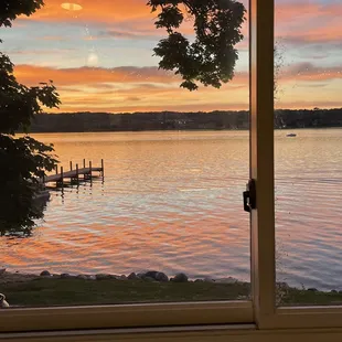 a view of a lake at sunset