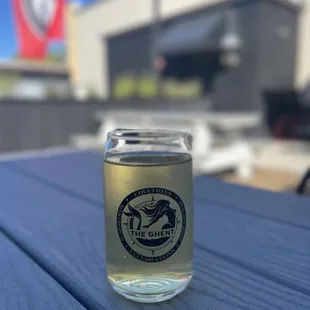 a glass of beer on a table