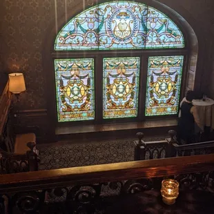 a stained glass window in a bar