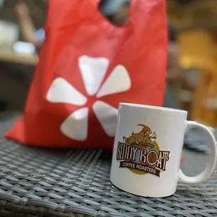 a coffee mug and pillow