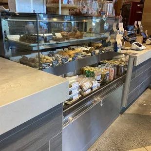 front counter with baked goods, some sweet and some savory. also some grab-and-go lunch options available