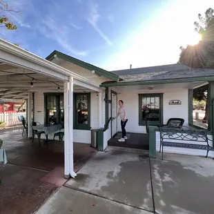 a man standing on the porch