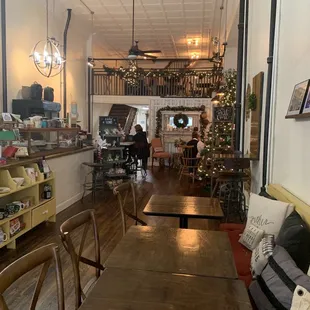 a dining room with a christmas tree