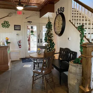 Entry.  Boutique, bar and a couple additional tables are upstairs.