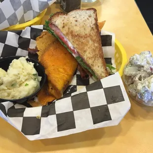 Half of the BLT and half of the grilled cheese with sides of mashed potatoes with Gouda and potato salad with dill.
