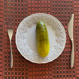 a pickle on a plate