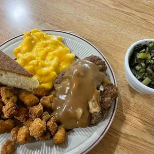 Hamburger steak with mushrooms and onions, fried okra, turnip greens, mac &amp; cheese, &amp; cornbread.