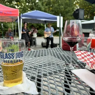 two glasses of beer on a table