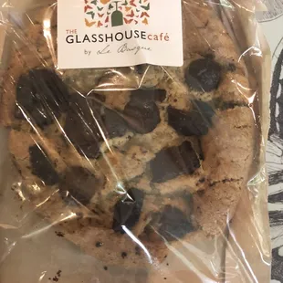 a chocolate chip cookie wrapped in plastic