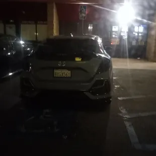 Parked illegally at a handicap spot with no permit