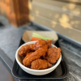 a bowl of buffalo wings