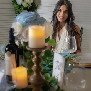 Beautiful bride with Blue floral table decor