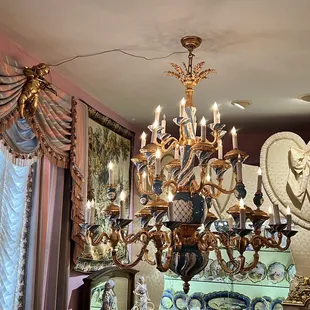 a chandelier in a pink room