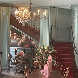 a dining room with a chandelier