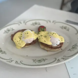 two eggs benedicts on a plate