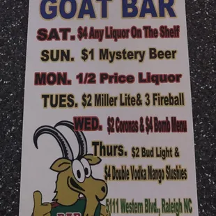 a sign for the goat bar