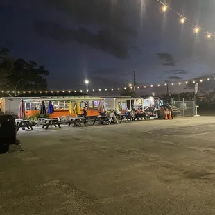 The tipsy trolley and the outdoor seating with a large asphalt parking area no dust flying around!