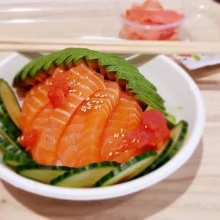 Salmon, cucumbers, avocado, and rice