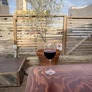 a glass of wine on a table