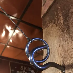 Ring Toss. Make your first shot and receive a free shot of liquor.