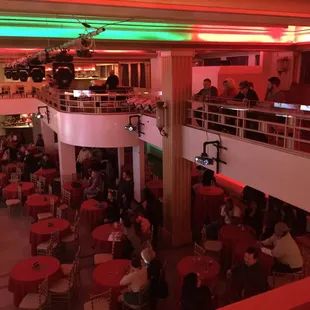 This place is a Real Speakeasy!!! Wow. Old  school with drop down screens, a stage and amazing lighting for bands.